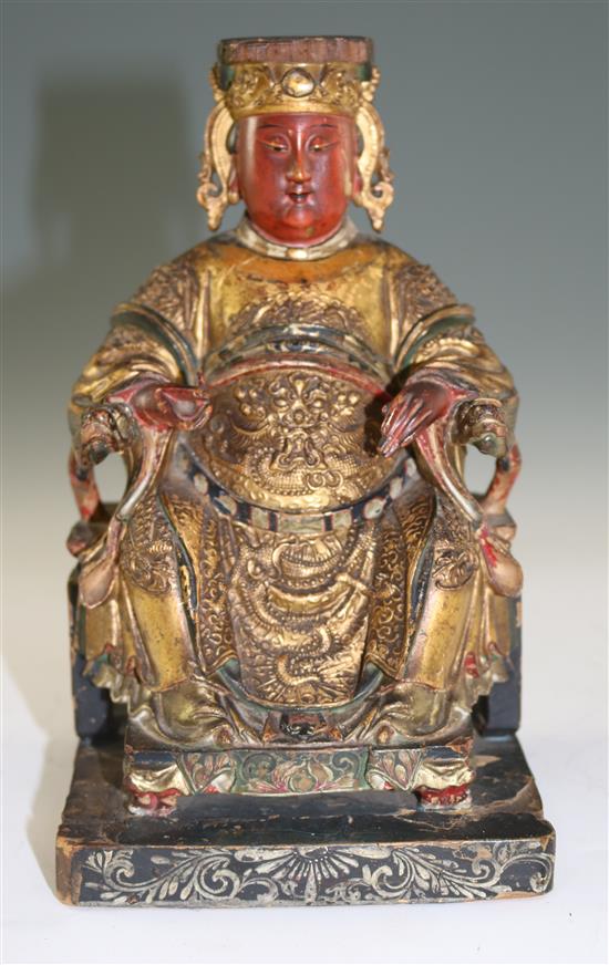 A Chinese gilt and polychrome wood figure of Xi Wangmu, 18th century, 22cm